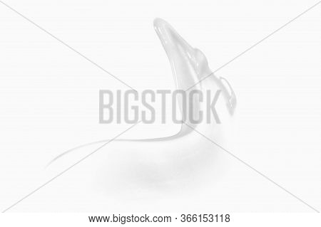 White Cream Swipe Isolated On White. Foundation Texture, Lotion Smudge, Moisturizer Sample. Body Sci