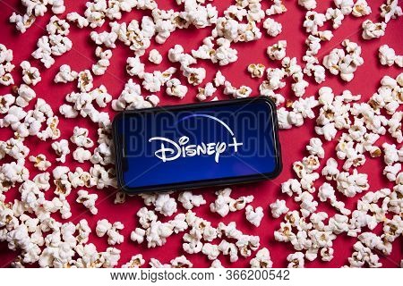 London, Uk - May 14 2020: Disney Plus Logo On A Smartphone With Popcorn