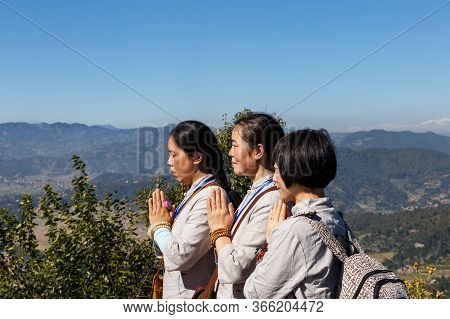 Simalchaur Syampati, Nepal - November 15, 2016: Three Women Pray Near Chorten At Namobuddha. Namo Bu