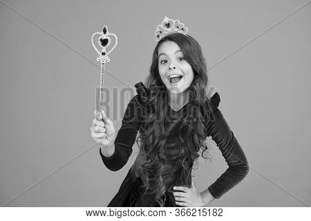 Excited Baby. Halloween Holiday. Magical Transformation. Imagine. Magic Trick. Magic Stick Concept. 