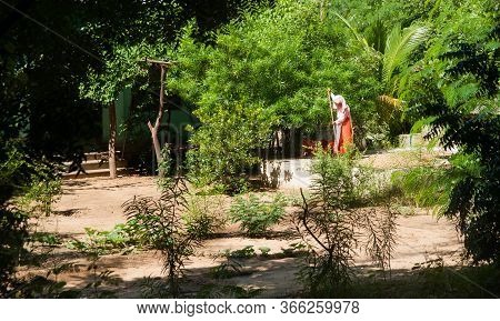 Sa Lay, Myanmar - October 31 2013;  Nun In Grounds Of Yokesone Monastery