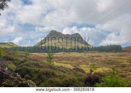 Double Hill Over Fields. Terceira Island In Azores With Blue Sky And Clouds.