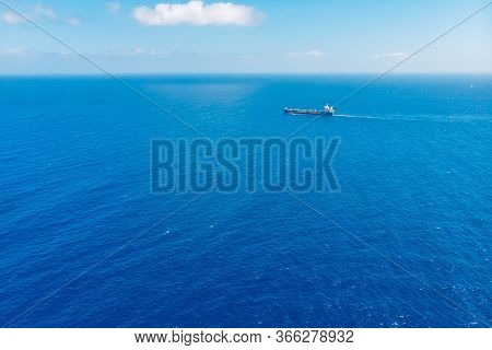 Oil Ship Chemical Tanker Sails Blue Sea. Aerial Top View. Concept Export