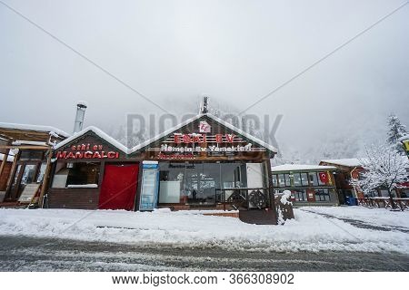 Ayder / Turkey - December 2 2019: Local Restaurant Covered In Snow In Winter Cloudy Day
