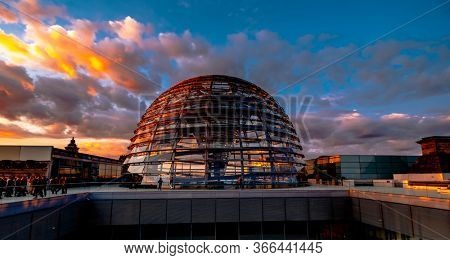 Berlin, Germany - 19 September 2020: Glass dome of Reichstag at sunset