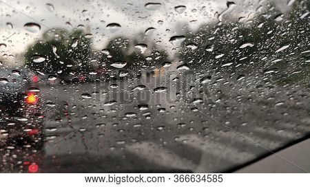 Raindrops On The Windshield Of The Car