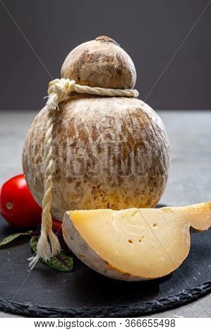 Italian Semi Hard Matured Caciocavallo Cheese, Handmade And Aged In Natural Underground Caves In Apu
