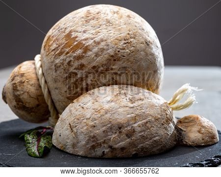 Italian Semi Hard Matured Caciocavallo Cheese, Handmade And Aged In Natural Underground Caves In Apu