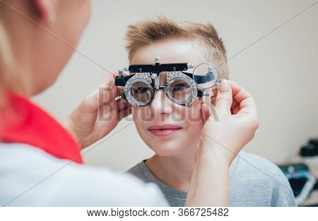 Trial Frame. Glasses For A Little Boy. Ametropia Correction With Glasses.