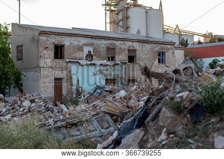 Collapsed House Full Of Rubble The City