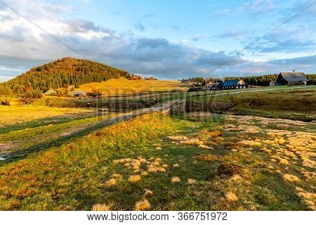 Bukovec Mountain Above Jizerka Village At Sunset Time. Spring In Jizera Mountains, Czech Republic.