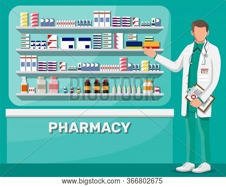Modern Interior Of Pharmacy And Male Pharmacist. Medicine Pills Capsules Bottles Vitamins And Tablet