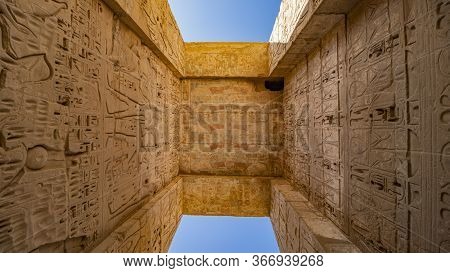Temple Of Medinet Habu. Egypt, Luxor. The Mortuary Temple Of Ramesses Iii At Medinet Habu Is An Impo