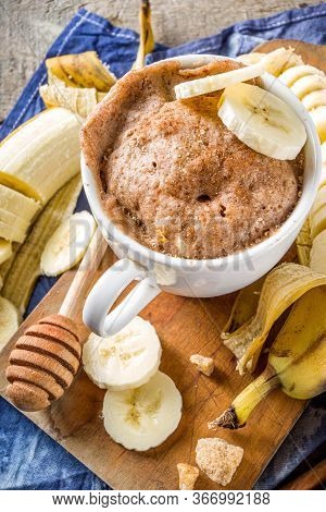 Portioned Banana Bread Mugcake In Small Mugs. Easy Sweet Baking Idea, With Fresh Bananas, Nuts, Hone