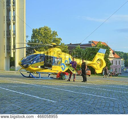 The Rescue Helicopter Lands On City Square. Czech Rescue Helicopter, Markings Krystof 4 - Christoph.