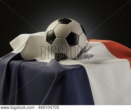 A Regular Soccer Balls Resting On A France Flag Draped Over A Plinth On An Isolated Studio Backgroun