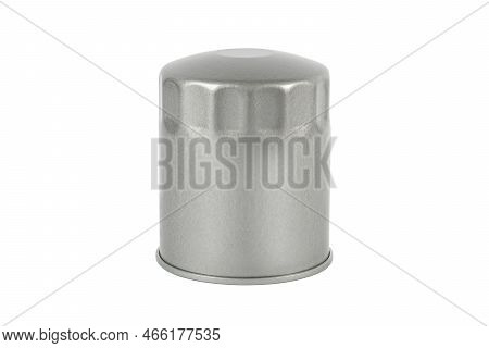 Silver Oil Filter On A White Background. Isolate.car Filter Closeup. Spare Parts Catalog.