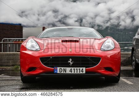 Ullensvang, Norway - July 30, 2020: Ferrari California, Red Grand Touring Sports Car Parked In Norwa