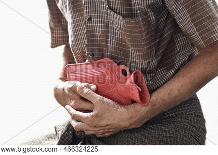 Asian Elder Man Suffering From Abdominal Pain. Caused By Stomach Ache, Enteritis, Colitis, Appendici