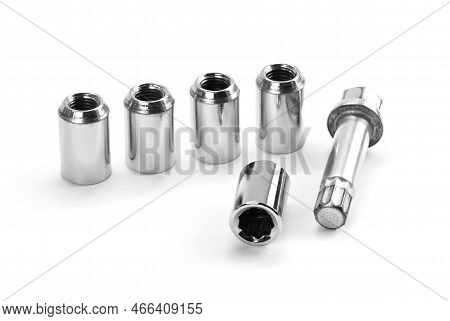 Car Lock Nuts, Wheel Nut That Protect The Wheels From Theft. Closeup Of The Isolate On A White Backg