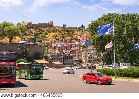 Tbilisi, Georgia - 07 23 2022: Traffic On A Roundabout On Noe Jordania Bank Street In Foreground And