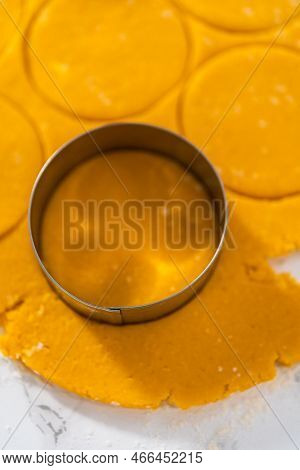 Lemon Wedge Cookies With Lemon Glaze. Rolling Cookie Dough With An Adjustable Rolling Pin And Cuttin