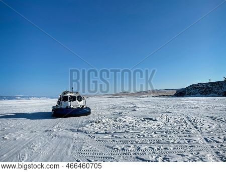 Khivus Winter Transport On Ice. Hovercraft. Ice On The Surface Of The Transparent Frozen Lake Baikal