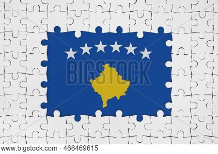 Kosovo Flag In Frame Of White Puzzle Pieces With Missing Central Parts