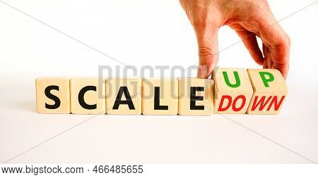 Scale Up Or Down Symbol. Concept Words Scale Up Scale Down Wooden Cubes. Businessman Hand. Beautiful