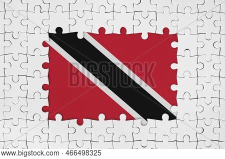 Trinidad And Tobago Flag In Frame Of White Puzzle Pieces With Missing Central Parts