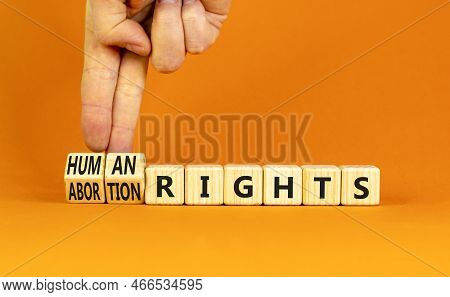 Abortion Rights Symbol. Concept Words Abortion Rights Are Human Rights On Wooden Cubes. Businessman 