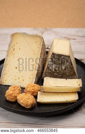 Pieces Of Cheese Tomme De Montagne Or Tomme De Savoie Made From Cow Milk In French Alps