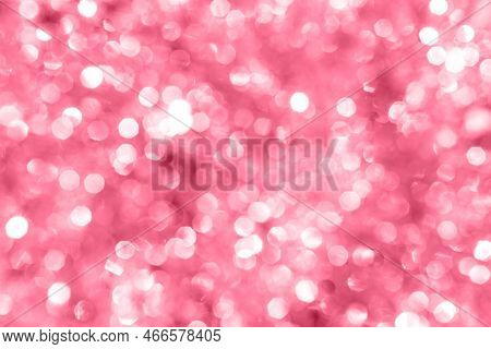 Trendy Viva Magenta Color Of 2023. Christmas Background. Blurred Defocused Red Lights.