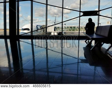 Helsinki Vantaa, Finland , September 24 2022: Traveller On Departure And Arrival Gate In A Modern In