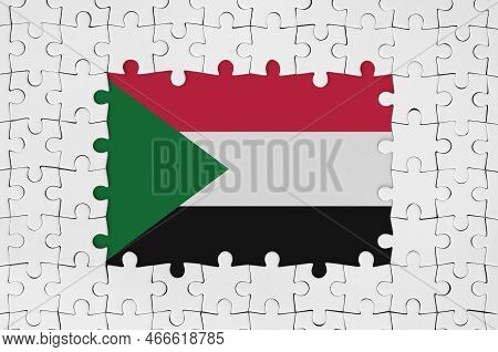 Sudan Flag In Frame Of White Puzzle Pieces With Missing Central Parts