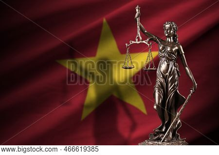 Vietnam Flag With Statue Of Lady Justice And Judicial Scales In Dark Room. Concept Of Judgement And 