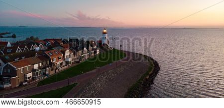 Urk Flevoland Netherlands Sunset At The Lighthouse And Harbor Of Urk Holland. Fishing Village Urk