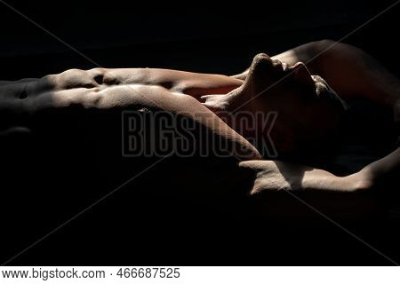 Mans Powerful Shoulders. Muscular Shirtless Manked Man Model Showing Six Pack Abs. Gay Sexy Model. M