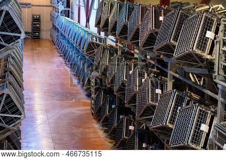 Production Of Cremant Sparkling Wine In Burgundy, France. Automatically Powered Riddling Remuage Box