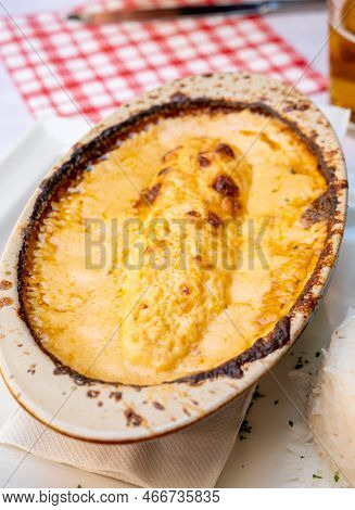 Quenelle, Speciality Of Lyon, Oval-shaped Dumplings Filled With Pike White Fish Served In Creamy Sau