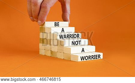 Warrior Or Worrier Symbol. Concept Words Be A Warrior Not A Worrier On Wooden Blocks On A Beautiful 