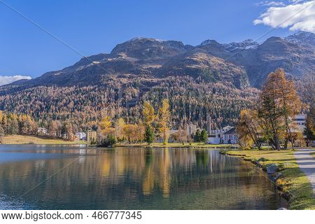 Lake St. Moritz In Autumn Colours In Engadine, Background The Piz Corvatsch Mountain, Switzerland