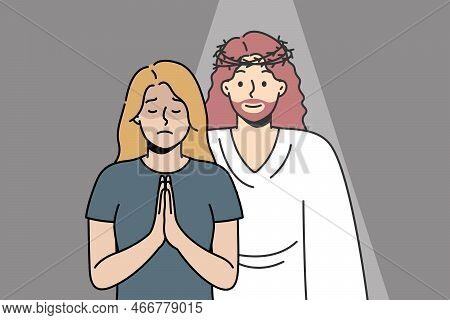 Christian Woman Prays To God With Her Palms Together In Prayer. Jesus Christ Appeared To Blonde Girl