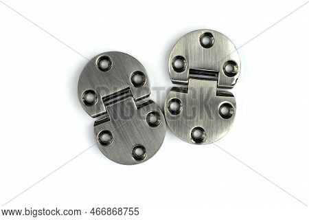 Chrome-plated Metal Hinges With Screw Holes, For Doors And Windows, Insulated On A White Background.