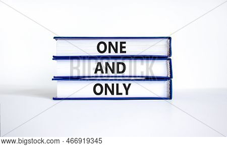 One And Only Symbol. Concept Words One And Only On Books On A Beautiful White Table White Background