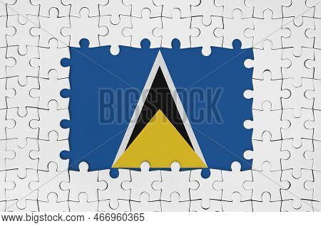 Saint Lucia Flag In Frame Of White Puzzle Pieces With Missing Central Parts