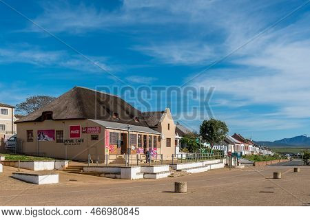 Elim, South Africa - Sep 21, 2022: A Street Scene, With A Supermarket And Historic Houses, In Elim I