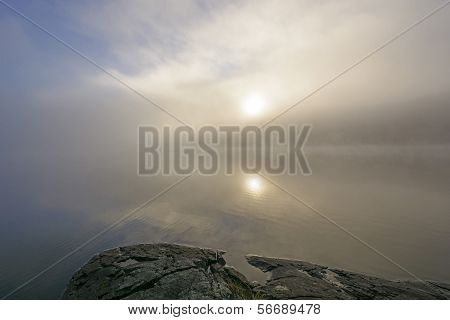 Sun And Fog On A Wilderness Lake