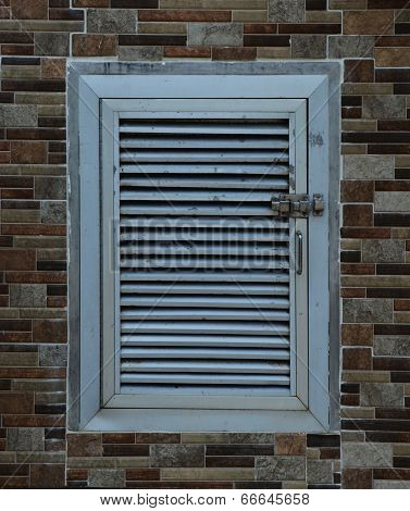 white window embed in the wall
