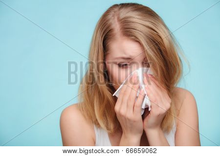 Flu Allergy. Sick Girl Sneezing In Tissue. Health